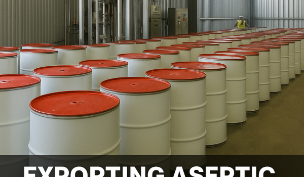 Aseptic tomato paste packed in steel drums inside a modern factory for export